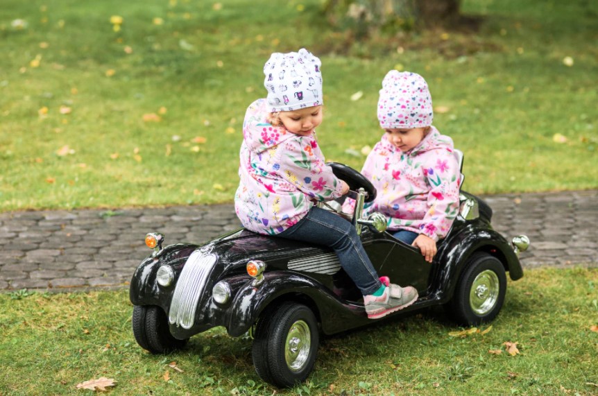 Exploring Kids Fascination with Ride-On Cars, Motorbikes, and Tractors: A Guide to Playful & Secure Motorised Toys